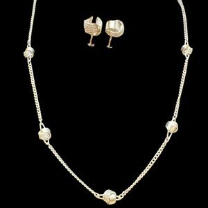 Avon Vintage 70's silver-tone knot necklace and matching clip on earrings set